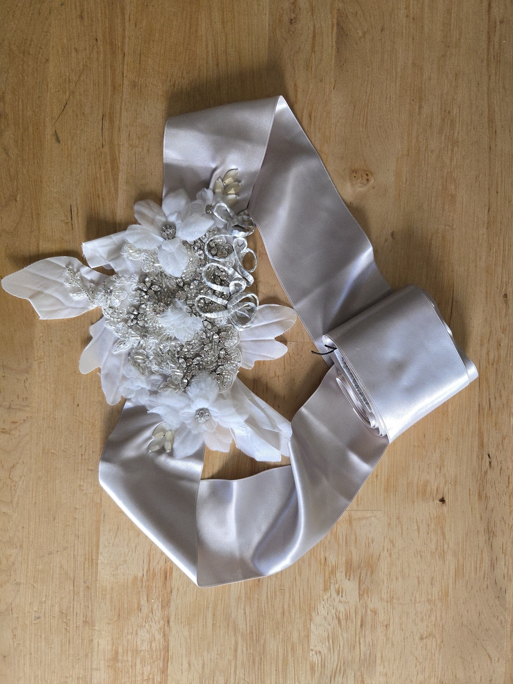 Justin Alexander Elegant Silver Satin Bridal Sash with Floral Applique